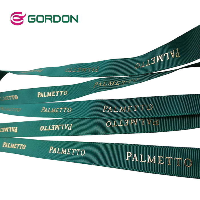 gordon ribbons custom logo puff&foil printed gold on grosgrain ribbon