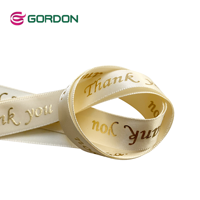 satin ribbon with puff foil printed gold logo